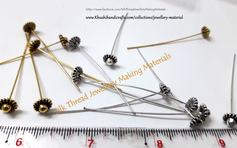 Designer Head pins in Antique Gold and Silver.Sold per pair!