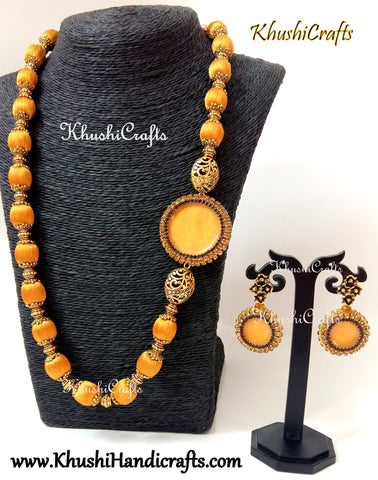 Silk Thread Jewellery -Gold Necklace with a resin coated side pendant
