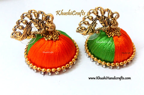 Dual Shaded Silk Jhumkas in Orange and Green with a Peacock Stud