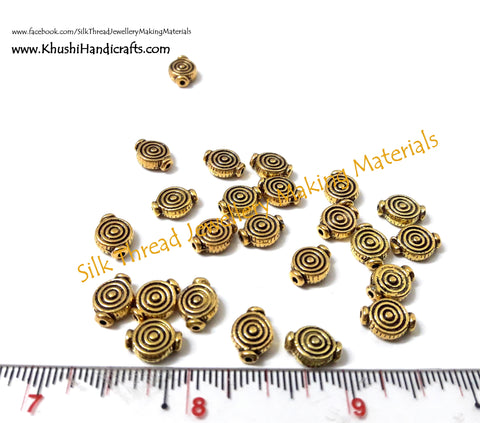 Antique Gold Spiral spacer beads.Sold as a set of 50 pieces -SP10