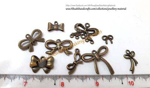Mixed Antique Bronze Ribbon charms for Bracelet and Necklace Jewelry. Sold as a combo!