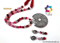 Pink Semiprecious Necklace with German silver Pendant and dangler earrings
