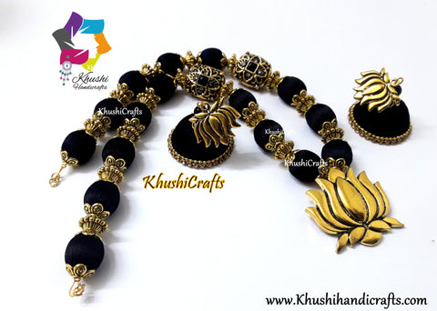 Black Silk Thread Jewelry complimented with a Lotus Pendant!