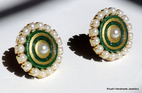 Green studs with pearl lining