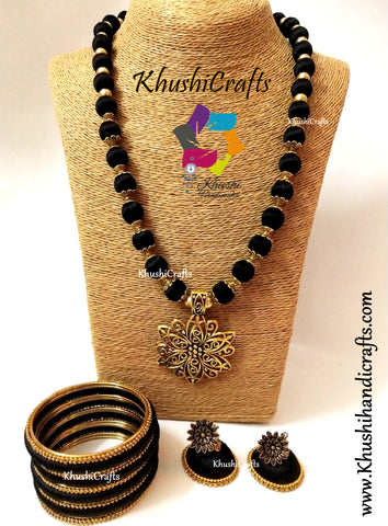 Black silk thread Necklace set with Flower Pendant and a set of bangles!