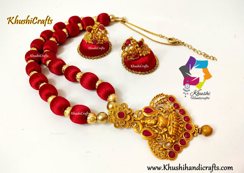 Silk Thread Jewelry in Red complimented with a Lakshmi Pendant!
