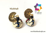 Wooden jhumkas with warli art and Peacock stud