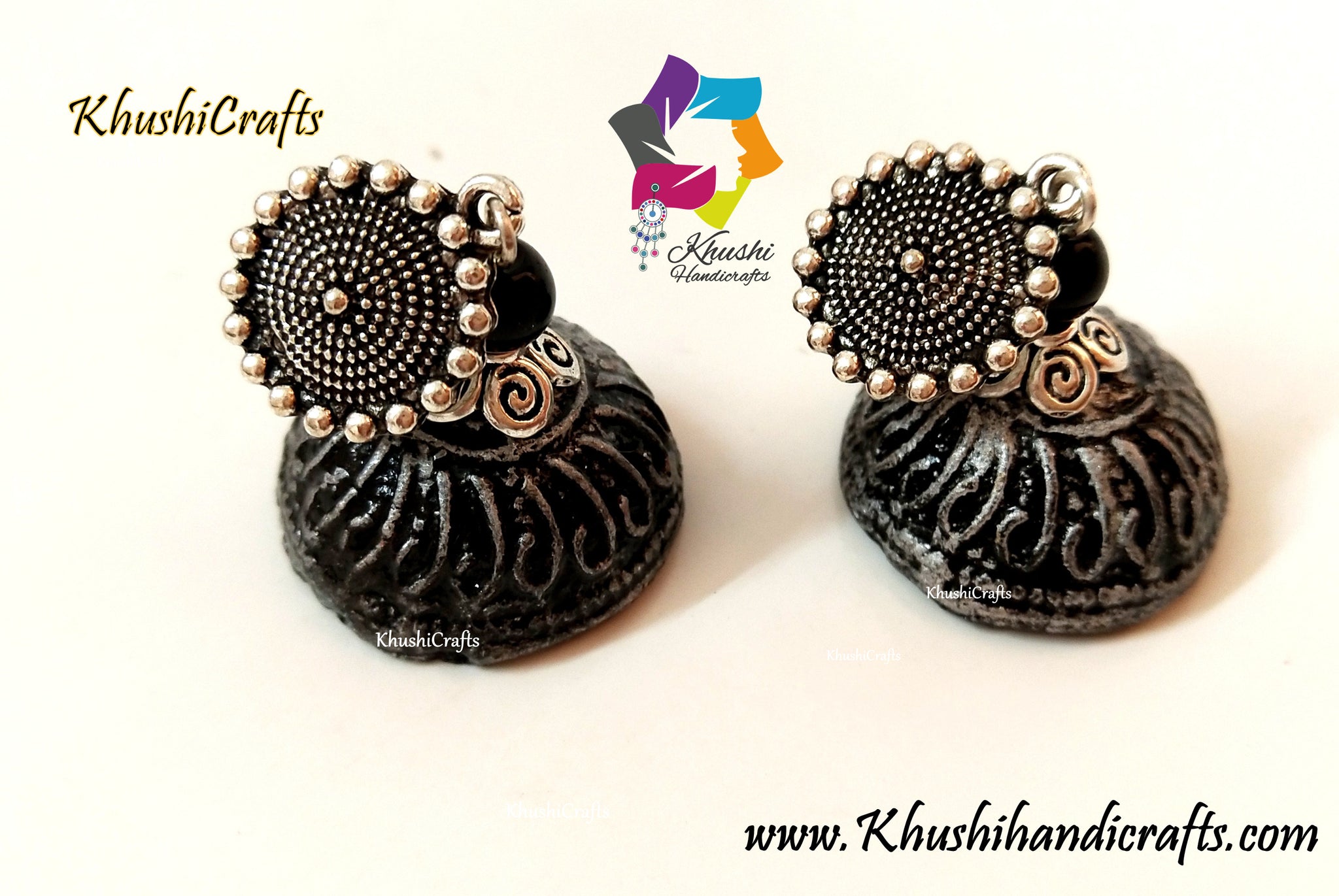 Gold Metal Small Jhumka With Black Pearls For Casual Wear