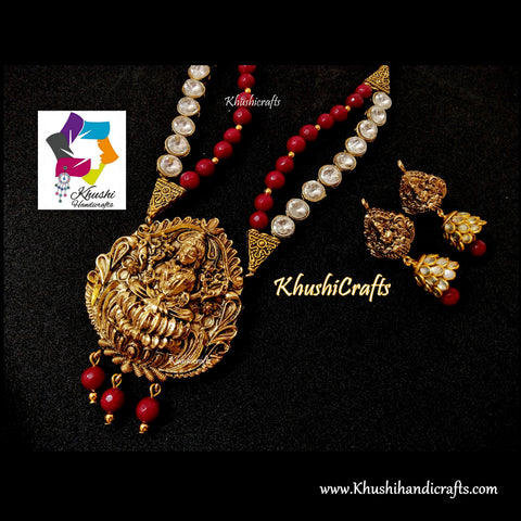 Deep Red shaded Semi precious Jewelry Set with a grand Temple Jewellery Lakshmi Pendant in Antique Gold!
